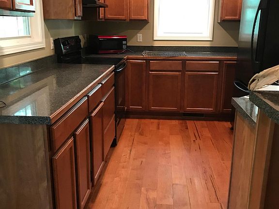 Beautiful kitchen with custom maple cabinets to go to the ceiling.