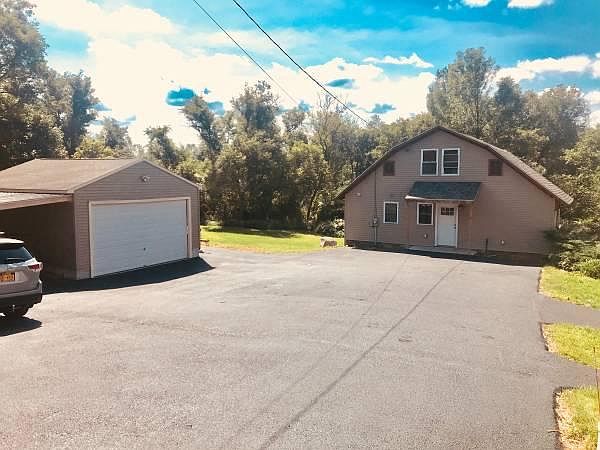 front of unit & parking. Garage does not come with unit.