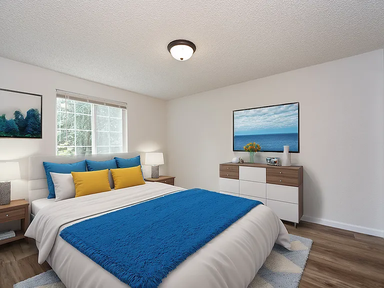 Relax in this chic bedroom designed for comfort and style.