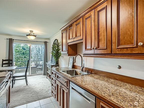 Stone Countertops and lots of cabinet space>