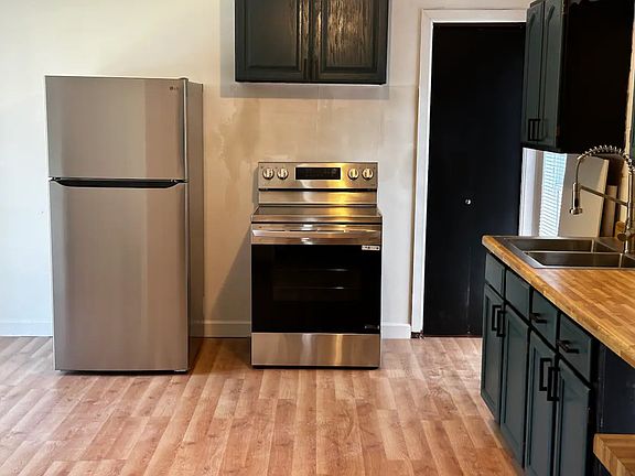 Fully updated Kitchen. Brand New refrigerator and oven/stove.