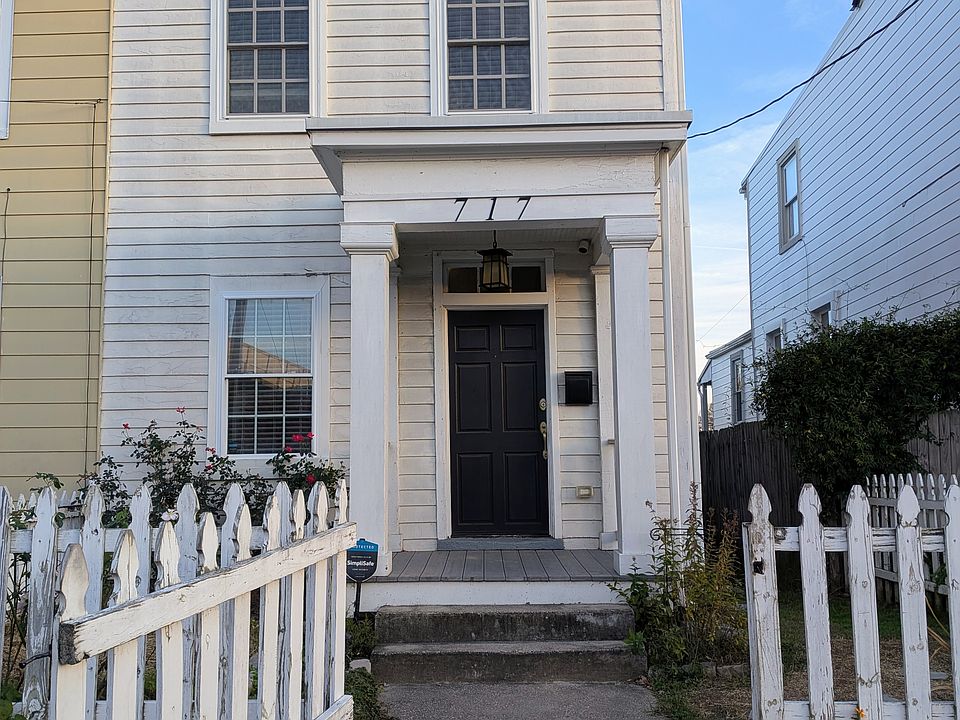 Front door, lots of public street parking for guests