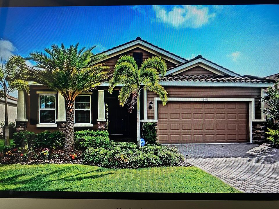Street view; Front entry with two car garage