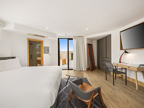 Enjoy a spacious 1-bedroom studio with a plush king-size bed and premium hotel-grade linens.