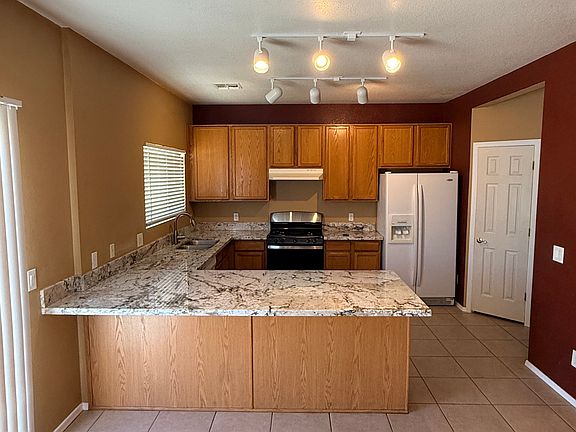 4th image of 3344 N Pebble Rapids Pl