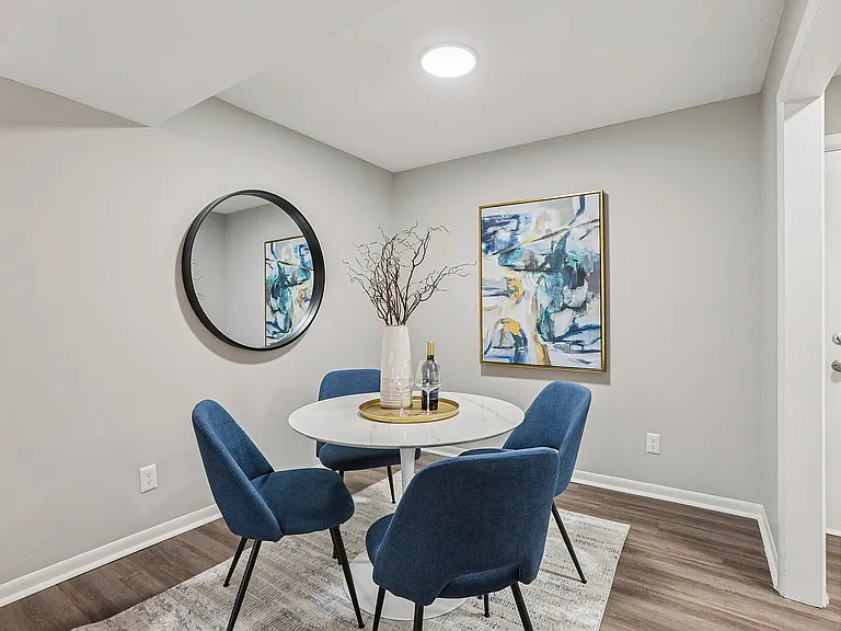 Dining area with hardwood-style flooring