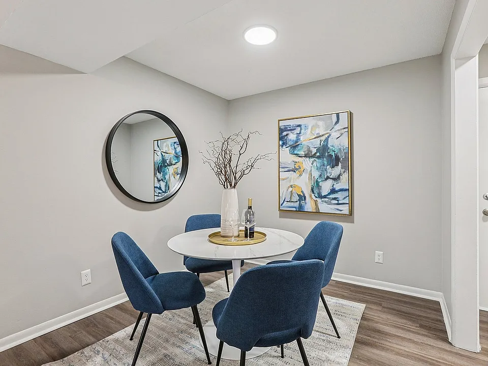 Dining area with hardwood-style flooring