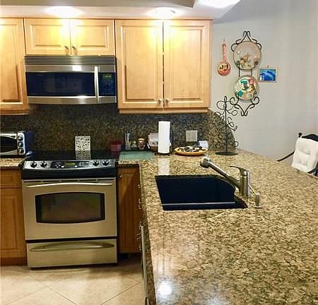2nd image of 2950 N Palm Aire Dr APT 201