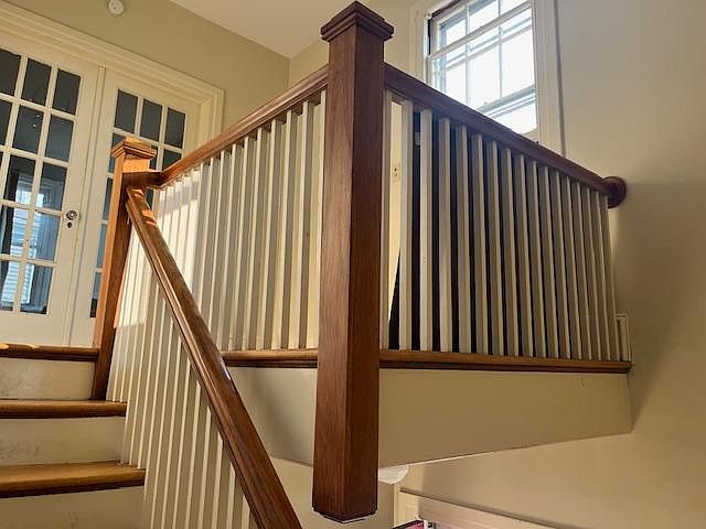 Private front entrance with turned staircase