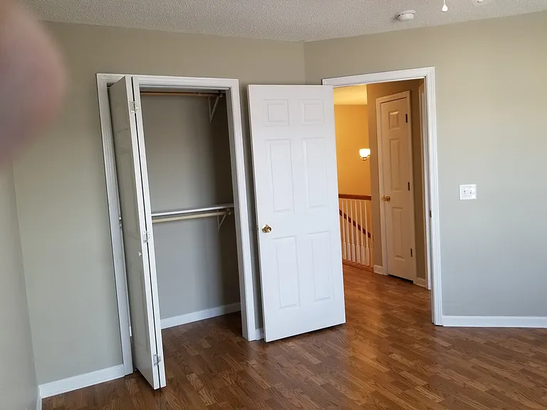 FRONT RIGHT BEDROOM WITH DOUBLE HUNG CLOSETS!