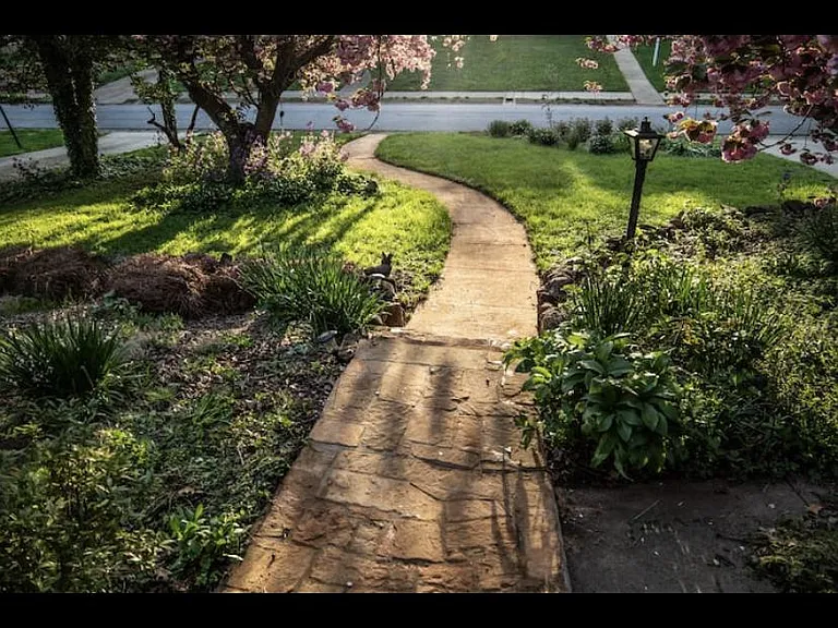 Sidewalk that leads to the shoppes at friendly