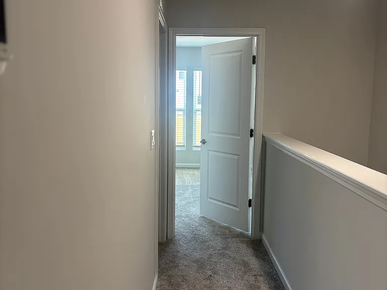 Hallway leading to master bedroom.