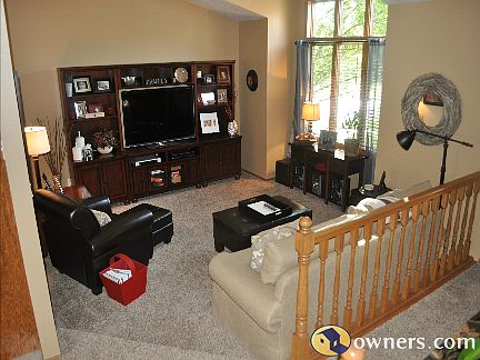 Sunken living room with vaulted ceiling