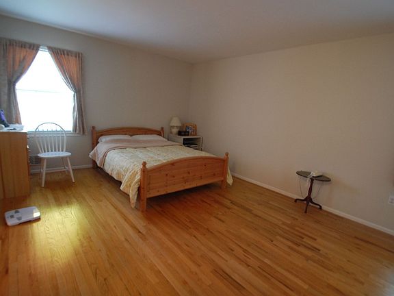 Master Bedroom - hardwood floors, 3 closets, makeup desk/dressing area
