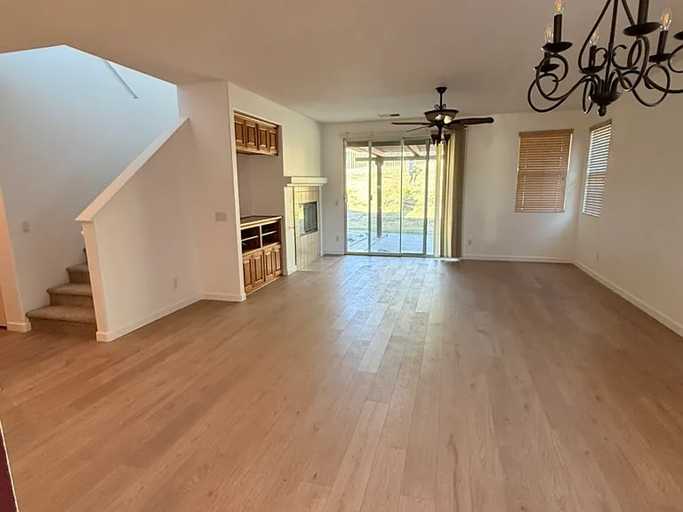 Living room and dining room with new LVP flooring