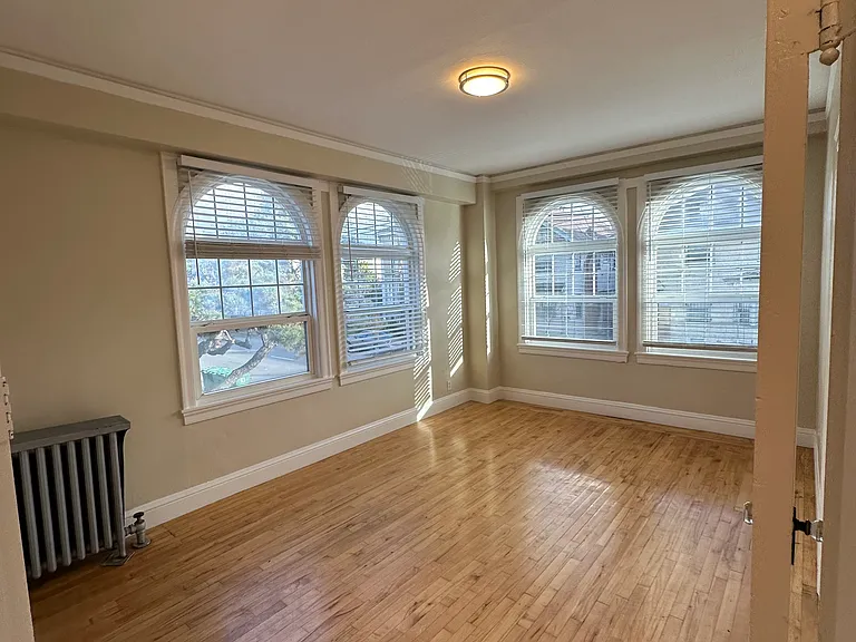 Window layout varies by floor and unit.