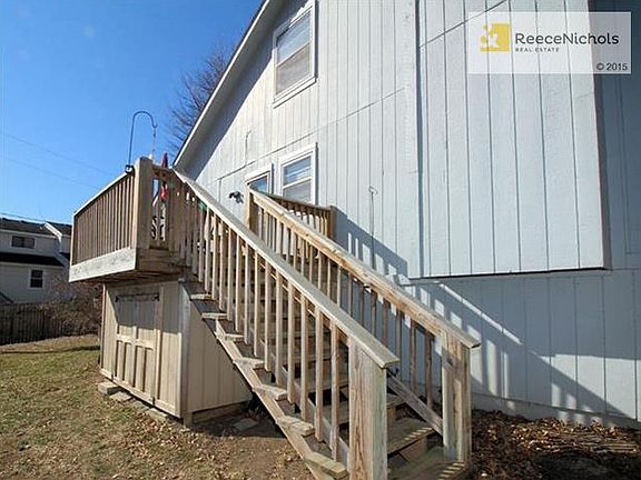 Nice deck off kitchen with storage area below