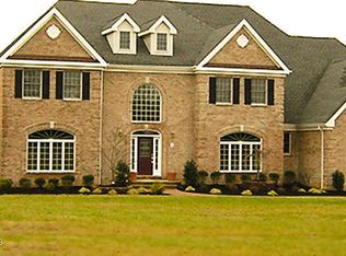 1 Cozy Dr, Manalapan, NJ 07726