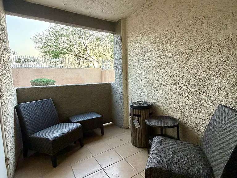 Relax and unwind on the private patio conveniently located just off the living room