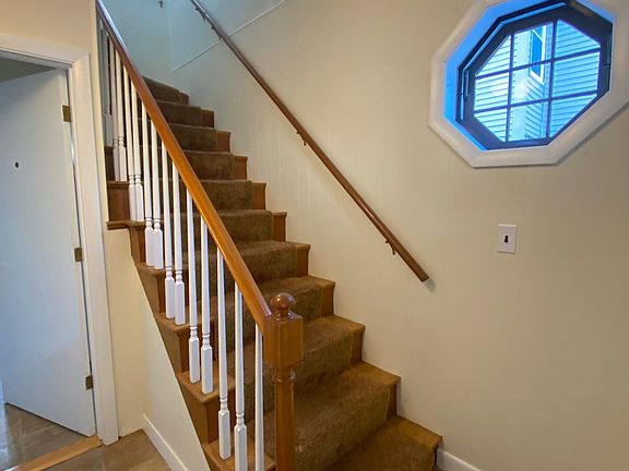 Common front hall-stairway to unit 2