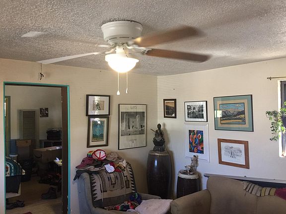 Cozy living room with new ceiling fan