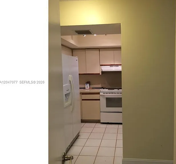 8977 SW 123rd Ct #202 — Photo 3