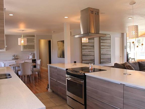 Open kitchen layout (stove top, oven, refrigerator, dish wa