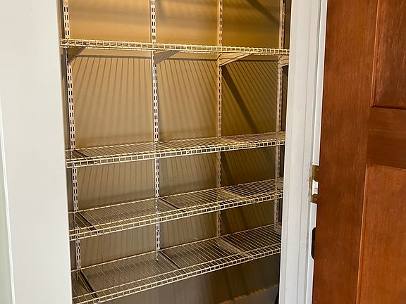 Panty, on left side of kitchen main area, walk-in, with auto light