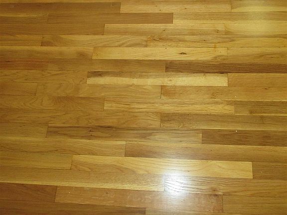 Refinished Solid White Oak Hardwood Floors throughout