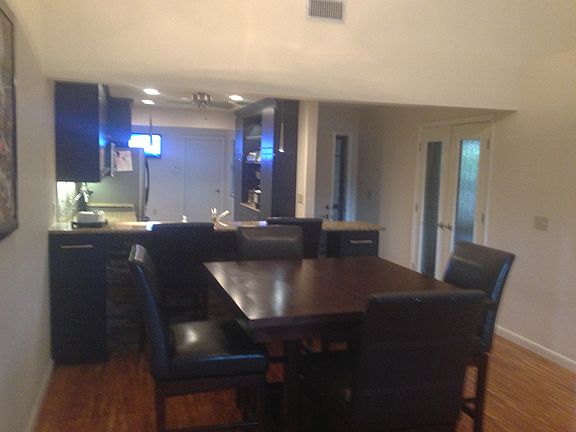 DR looking into kitchen/eat up bar and entry