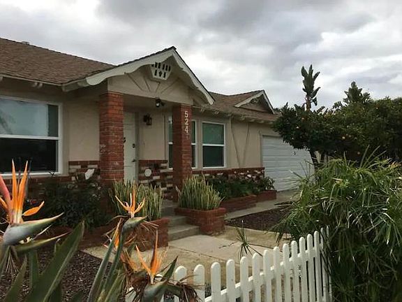 Front of the house, notice double car garage.