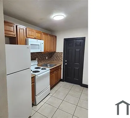 877 NW 10th St — Photo 3