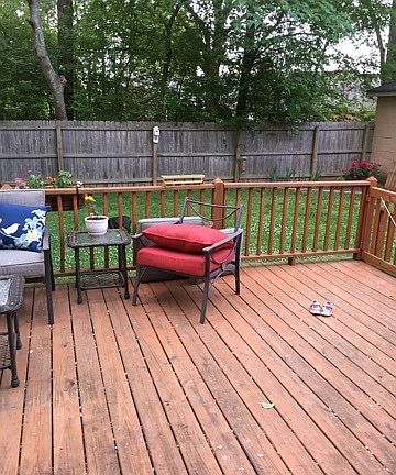 deck and fenced back yard