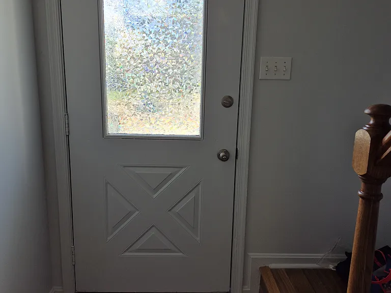 Privacy film on front door.