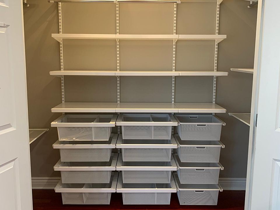 Kitchen pantry closet with customizable shelving included
