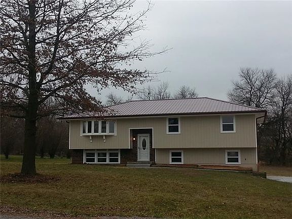 Front of home offers a lot of country curb appeal.