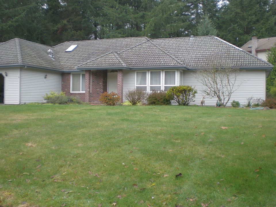Wonderful home situated on a corner lot in Cougar Ridge Community