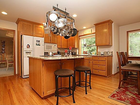 Kitchen with granite/hardwoods