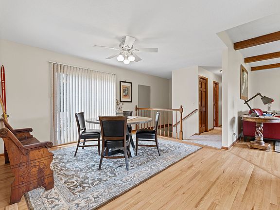 Dining room off the kitchen and living room, with sliding door to new deck