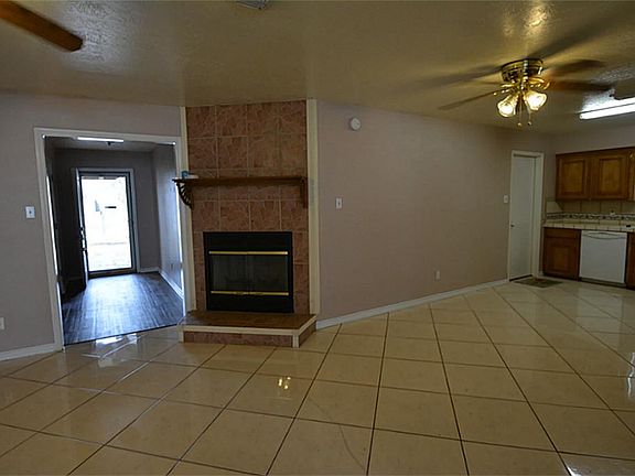 WITH A WOOD BURNING FIREPLACE.