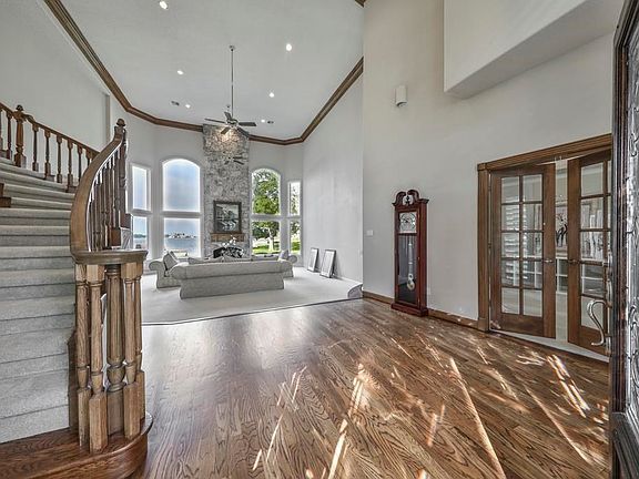 The natural lighting in this home is magical. The plantation shutters and beautiful leaded glass front door let in the perfect amount of light.