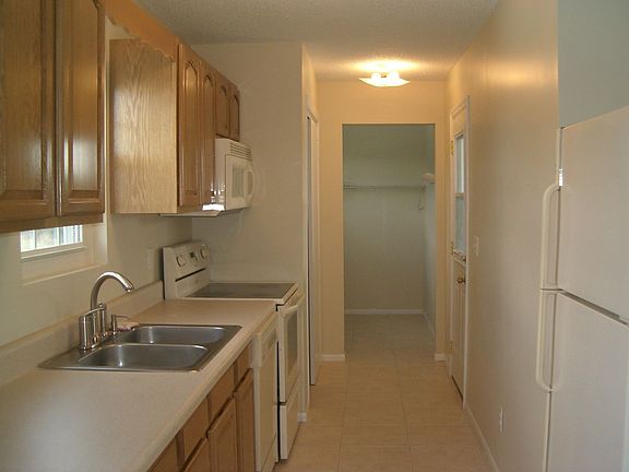 kitchen with laundry room off it