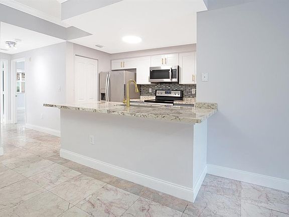 5th image of 5860 W Sample Rd