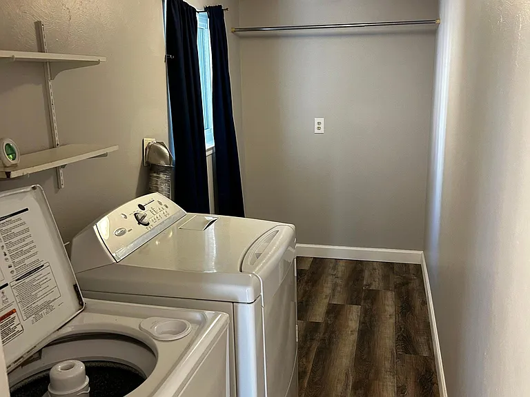 laundry room with washer and dryer.