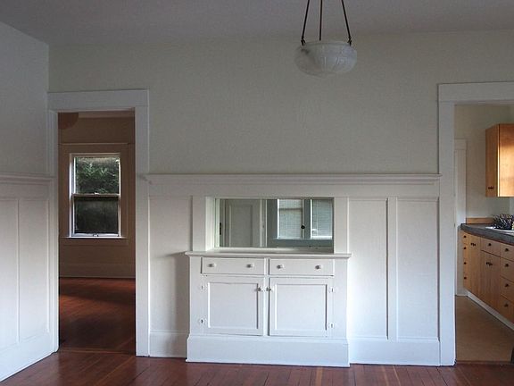 Dining room with plate-rail built in side butler, period cha