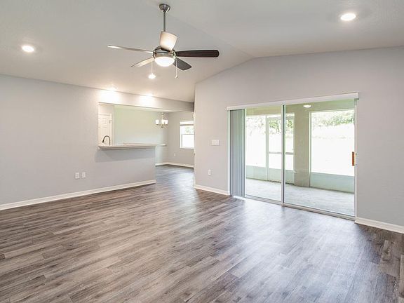 Spacious gathering room with volume ceiling - Richmond home plan by Highland Homes