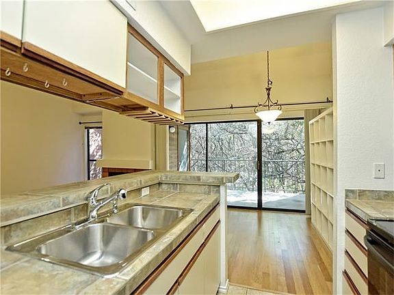 Kitchen and Breakfast room overlooks patio.