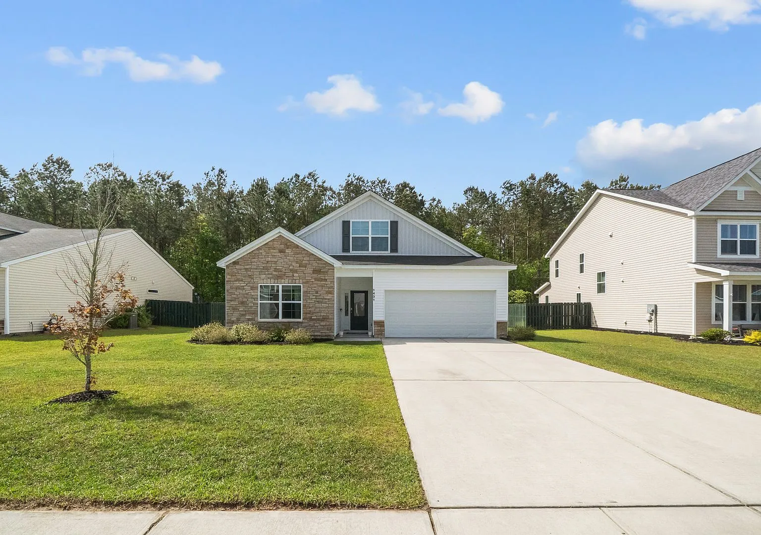 Beautiful 4-Bedroom Home in The Commons Featuring a Convenient Floor Plan — Photo 1