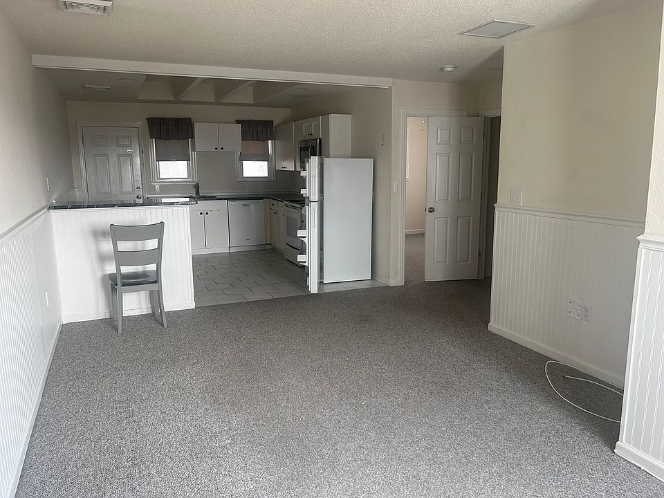 Living Room Area and Kitchen Area