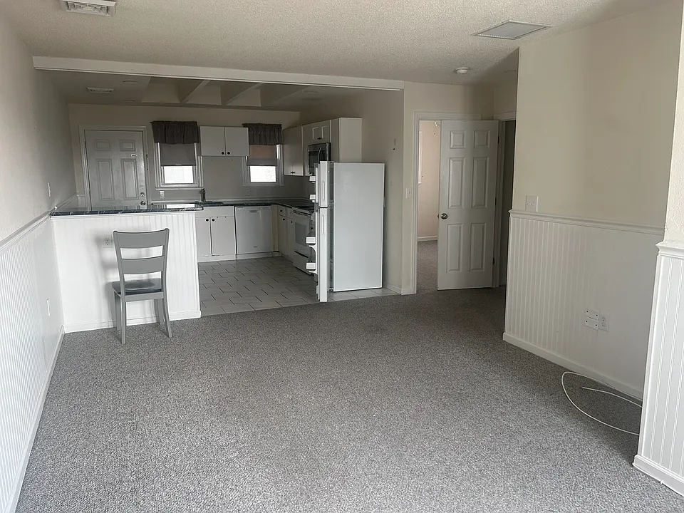 Living Room Area and Kitchen Area
